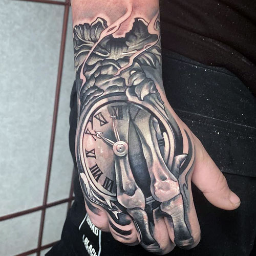 Clock Skeleton Hand Tattoo Designs