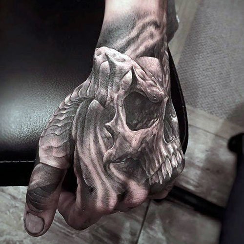 Awesome Skull Face Tattoo on the Hand Designs