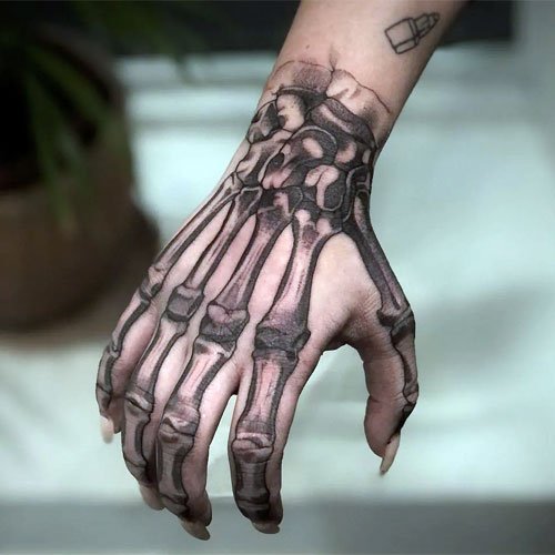 134 MustHave Admirable Designs Of The Skeleton Hand Tattoo