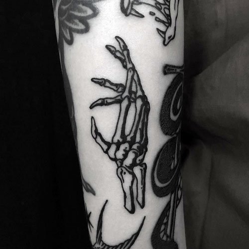 Traditional Skeleton Hand Tattoo Designs